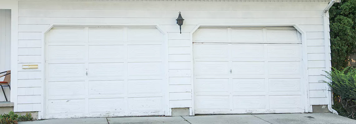 Roller Garage Door Dropped Down Replacement in Jupiter, FL