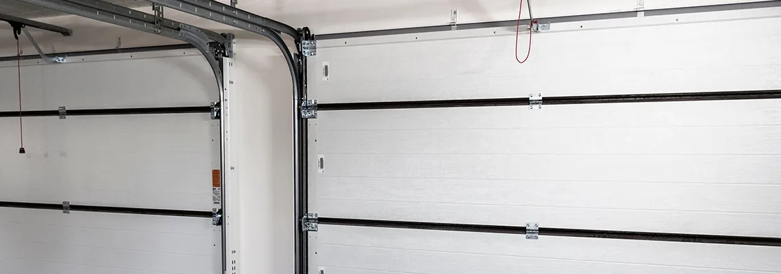 Fix Folding Garage Door Jerking in Jupiter, Florida