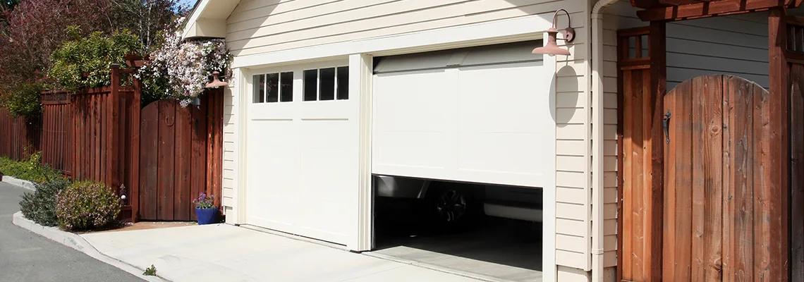 Fix Metal Garage Door Jerking in Jupiter, Florida